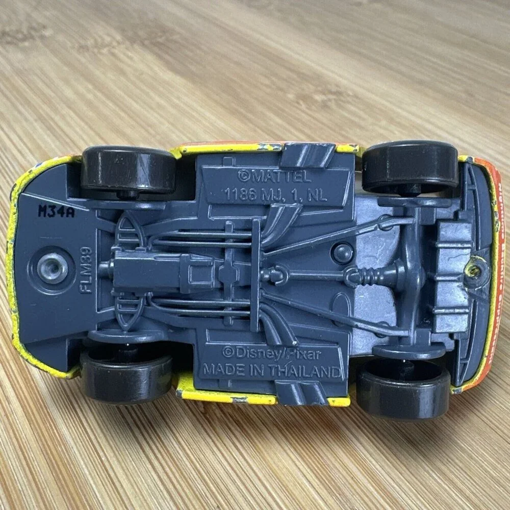 Disney Pixar Cars Diecast Mattel RPM #64 Yellow Blue Race Car‎ Rubber Tires